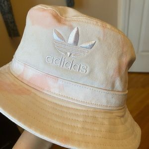 white and pink tie dye bucket hat from adidas